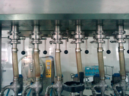 linear filling machine for cream pukulan dekat pada jentera pengisian krim.jpg