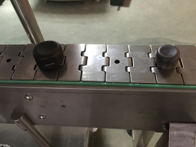 mesin pelabelan lengan pita.jpg