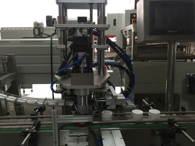 mesin pengedap balang.jpg