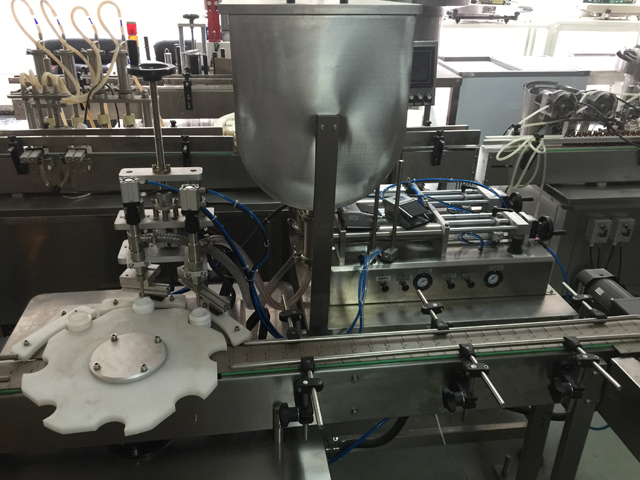 mesin pengisi dua balang.jpg