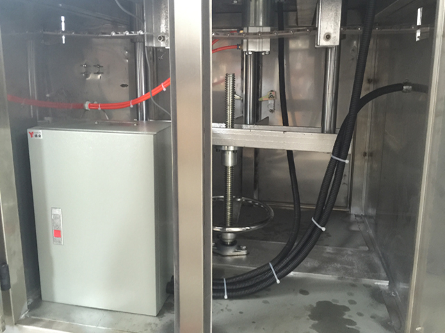 mesin penutup pengedap dalam tin.jpg