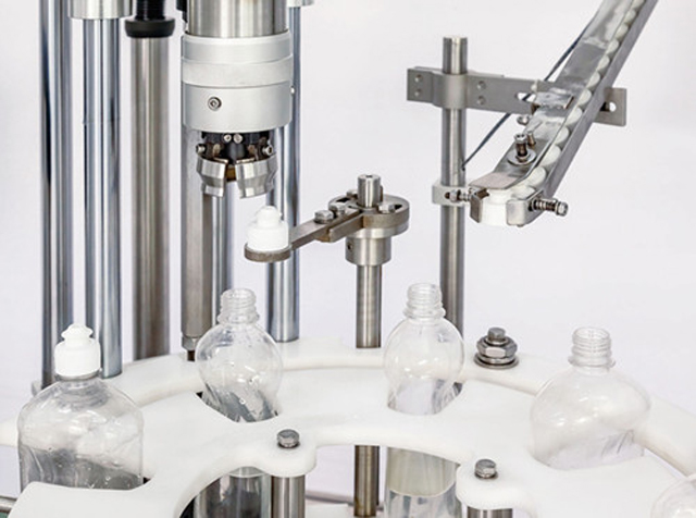 capping head close shot butiran mesin capping tunggal.jpg