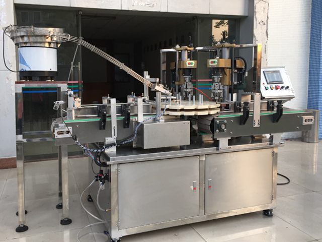 capping machine with 2 capping heads peralatan penutup skru separa automatik.jpg