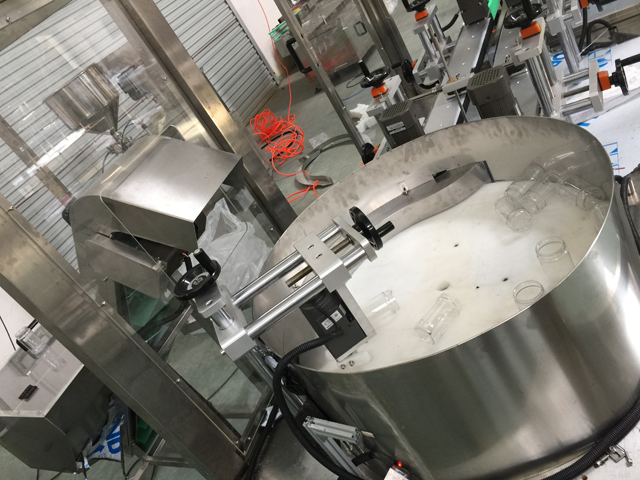 bottles unscrambler lifting system.jpg