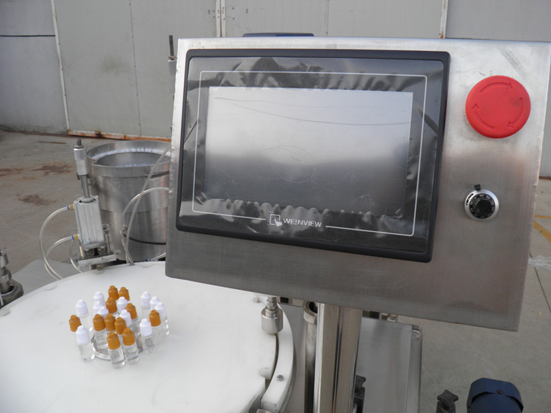 filling plugging capping labeling production line Pelabelan penutup pengisi botol PLC cecair E.jpg