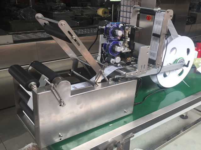 semi automatic bottle labeling equipment manual mesin pelabelan botol.jpg