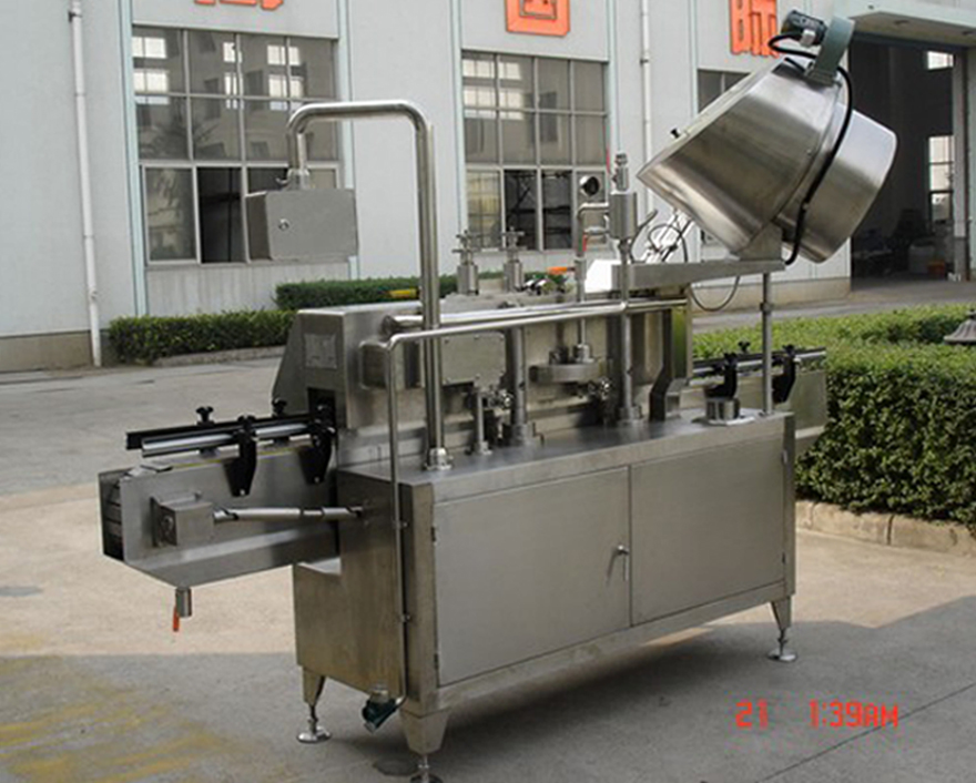 PLC-controlled system glass Jar twist off Steam Capper equipment vacuum capping machine for Glass Jars tangkapan belakang penutup vakum pintal.jpg