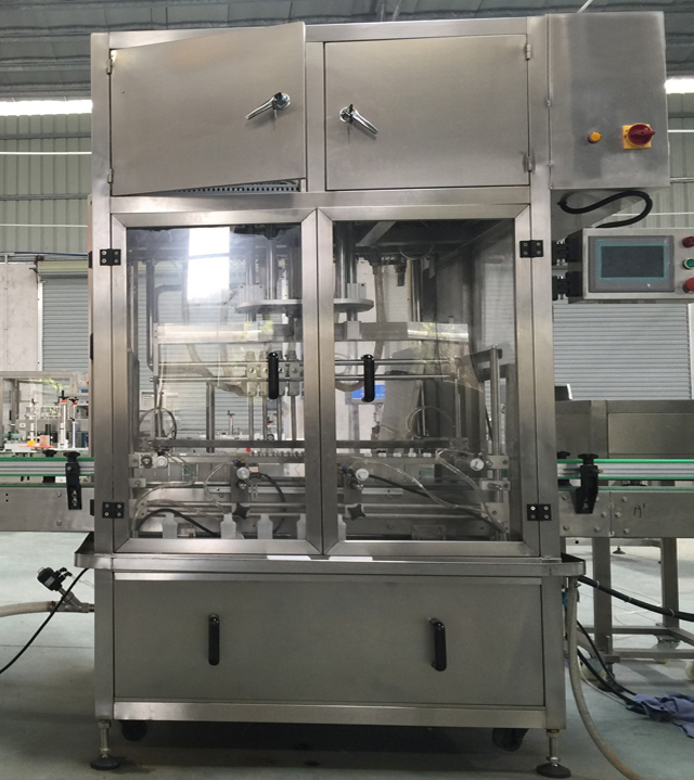 Linear filling machine with 4 filling heads MESIN PENGISIAN LINEAR.jpg