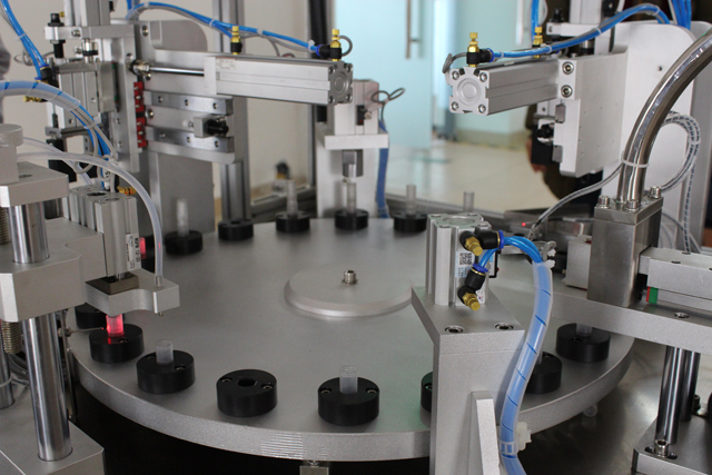 mesin penekan mengisi automatik.jpg