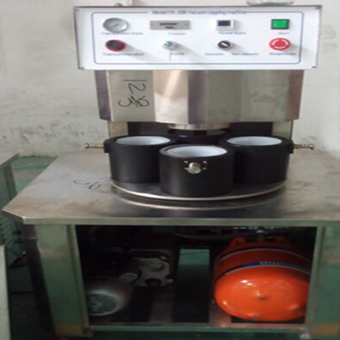 illustration of vacuum capping machine semi automatic ilustrasi untuk vakum capping.jpg