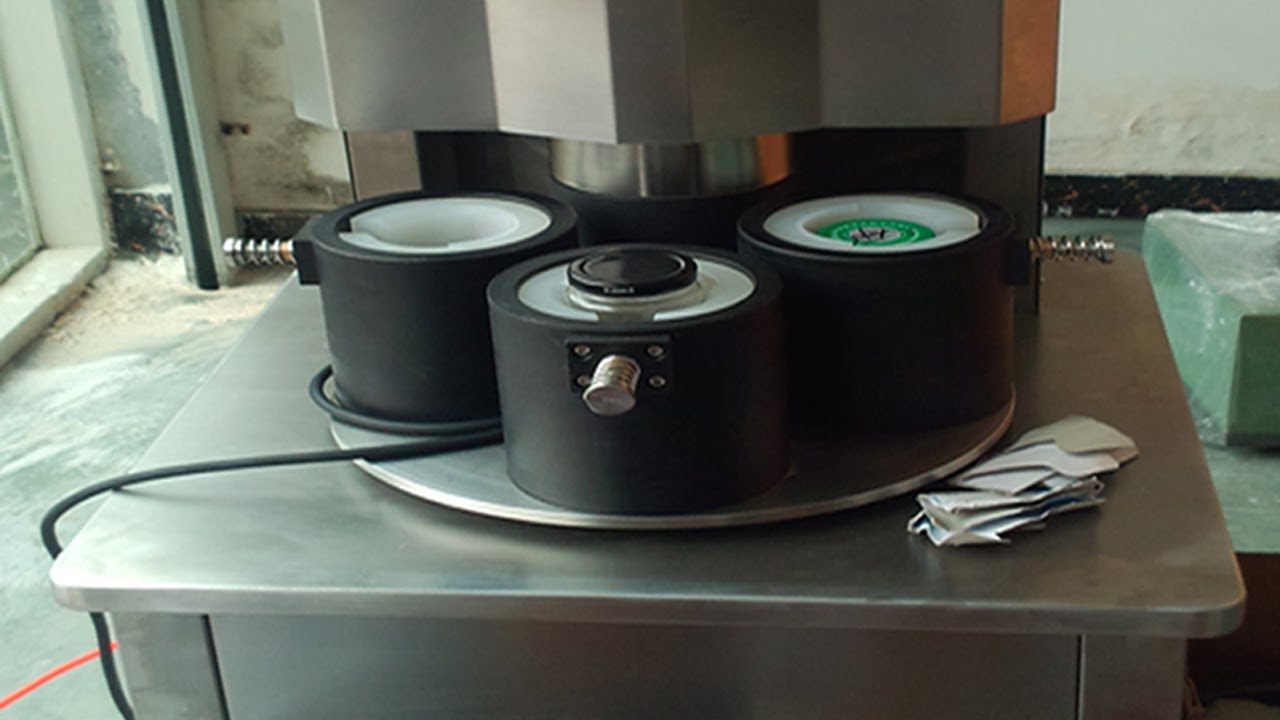 four heads vacuum capping machine semi automatic manual capper vakum.jpg