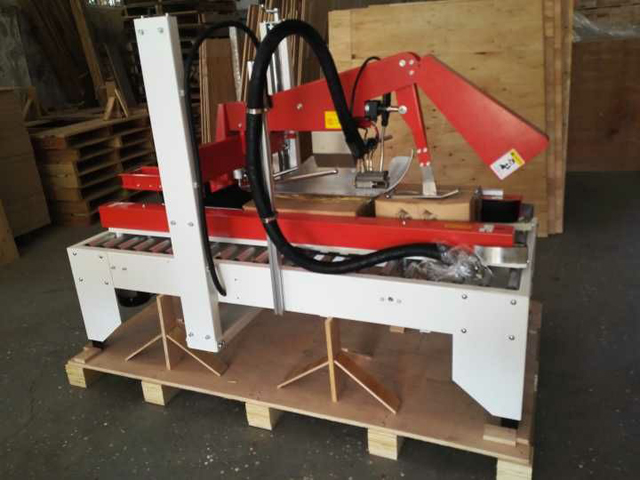 mesin pengedap kadbod gam cair panas.jpg